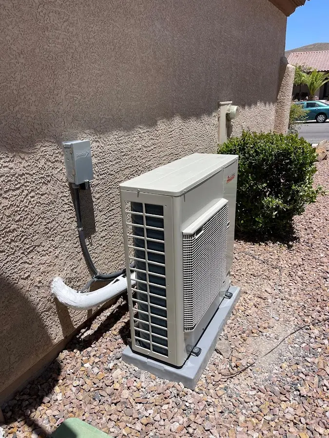 Residential air conditioning condenser unit in Armada
